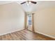 Bright bedroom features vaulted ceiling, light walls, and hardwood floors at 7033 Brecken Trce, Lithonia, GA 30058