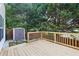 Lovely wooden deck perfect for relaxing and entertaining with storage shed at 7033 Brecken Trce, Lithonia, GA 30058
