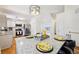 Eat in kitchen features a center island and a breakfast bar with granite countertops at 7033 Brecken Trce, Lithonia, GA 30058