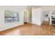 Hardwood floors, and staircase, with lots of natural light and a view of the backyard at 7033 Brecken Trce, Lithonia, GA 30058