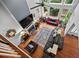 Airy living room featuring a fireplace, large windows, hardwood floors, and comfortable seating for a cozy atmosphere at 828 Ivy Ne Cv, Norcross, GA 30071