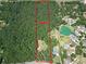 Aerial view of property with 6.07 acres, surrounded by lush forest, marked in red at 133 Harold Dr, Mcdonough, GA 30253