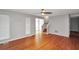 Living room with wood floors and stairway at 133 Harold Dr, Mcdonough, GA 30253