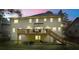 Two-story home with a deck perfect for enjoying the backyard view at 3130 Crestmont Nw Way, Kennesaw, GA 30152