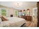 Spacious main bedroom with wood floors, natural light, and furniture set at 3130 Crestmont Nw Way, Kennesaw, GA 30152