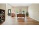 Bright home office area featuring hardwood floors and ample natural light through the windows at 3130 Crestmont Nw Way, Kennesaw, GA 30152