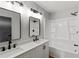 Modern bathroom with double vanity, quartz countertop, and new fixtures at 40 Melton Way, Covington, GA 30016
