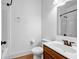 The bathroom has tiled floors, with a toilet, sink, mirror, and shower/tub combo at 7601 Watson Cir, Locust Grove, GA 30248