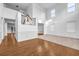 Bright living room with high ceilings, hardwood floors, and large windows at 7601 Watson Cir, Locust Grove, GA 30248