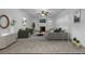 Bright living room with plush seating, fireplace, and modern decor at 7601 Watson Cir, Locust Grove, GA 30248