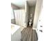 Bathroom featuring a shower-tub, toilet, and sink with modern fixtures and wood look flooring at , Covington, GA 30014