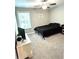 Comfortable bedroom with natural light, carpet flooring, and ceiling fan at , Covington, GA 30014