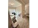 Versatile bonus room featuring a comfortable chaise lounge, desk setup, and ample natural light at , Covington, GA 30014