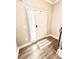 Entryway with natural light, a front door with lock, and wood-look vinyl flooring at , Covington, GA 30014