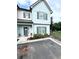 Charming two-story home with light blue siding, gray shutters, and a welcoming front entrance at , Covington, GA 30014