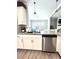 Kitchen showcasing granite countertops, stainless steel dishwasher, and white cabinetry at , Covington, GA 30014