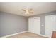 Minimalist bedroom with double door closet and neutral colored walls at 1252 Heritage Dr, Villa Rica, GA 30180