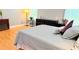 Bedroom features hardwood floors, neutral walls, and tasteful decor at 1252 Heritage Dr, Villa Rica, GA 30180