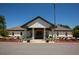 Welcoming clubhouse entrance with columns and landscaping showcasing an inviting atmosphere for social events at 1252 Heritage Dr, Villa Rica, GA 30180