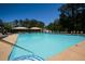 Bright and spacious community pool, surrounded by lounge chairs, perfect for relaxing and enjoying the sunshine at 1252 Heritage Dr, Villa Rica, GA 30180