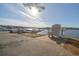 Scenic lake view with Adirondack chair near the Dockside Marina and boat docks at 1252 Heritage Dr, Villa Rica, GA 30180