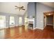 Spacious living room with hardwood floors, a fireplace, and a neutral color scheme at 1252 Heritage Dr, Villa Rica, GA 30180
