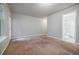 Bright room featuring large windows and an en suite bathroom at 1293 Liberty Nw Pkwy, Atlanta, GA 30318
