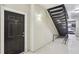View of condo entrance with dark door, unit number 3108, and stairs to the upper levels at 3108 Westchester Ne Rdg, Atlanta, GA 30329
