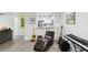 Stylish open concept living room, adjacent to the kitchen, perfect for entertaining guests or relaxing at 3108 Westchester Ne Rdg, Atlanta, GA 30329