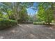 Spacious lot features manicured hedges and mature trees at 3108 Westchester Ne Rdg, Atlanta, GA 30329