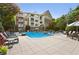 Inviting pool area with lounge chairs and lush greenery, perfect for relaxing and enjoying the outdoors at 3108 Westchester Ne Rdg, Atlanta, GA 30329