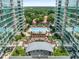 A luxury building overlooking a pool, cabanas, outdoor lounge and green space; offering resort-style living at 943 Peachtree Ne St # 2001, Atlanta, GA 30309