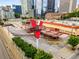 Unique overhead view of The Varsity restaurant, showcasing the parking lot, colorful sign, and surrounding cityscape at 943 Peachtree Ne St # 2001, Atlanta, GA 30309