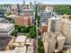 Stunning city view featuring high-rise buildings, lush greenery, and a vibrant cityscape, emphasizing location at 943 Peachtree Ne St # 2001, Atlanta, GA 30309