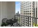 Cozy balcony with seating and scenic city views at 943 Peachtree Ne St # 2001, Atlanta, GA 30309