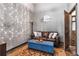Cozy living room setup with couch, ottoman, and warm lighting at 943 Peachtree Ne St # 2001, Atlanta, GA 30309