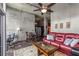 Open living area with hardwood floors, exposed ceiling, and dining area at 943 Peachtree Ne St # 2001, Atlanta, GA 30309