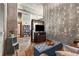 Cozy living room with concrete accent wall, modern furnishings, and plenty of natural light at 943 Peachtree Ne St # 2001, Atlanta, GA 30309