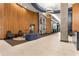 A modern lobby with wood accents, stylish seating, and contemporary lighting, creates a welcoming entrance at 943 Peachtree Ne St # 2001, Atlanta, GA 30309