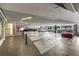 An indoor parking garage showcases designated parking spots and charging stations for electric vehicles at 943 Peachtree Ne St # 2001, Atlanta, GA 30309