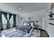 Bedroom with a large bed, carpet, and curtains at 3085 Saint Andrews Dr, Duluth, GA 30096