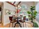 Bright breakfast nook with large arched window overlooking the backyard at 3085 Saint Andrews Dr, Duluth, GA 30096