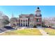 Elegant brick City Hall with clock tower, manicured lawn, and classical architectural details at 3085 Saint Andrews Dr, Duluth, GA 30096