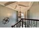 Grand foyer features decorative chandelier and wrought iron staircase at 3085 Saint Andrews Dr, Duluth, GA 30096