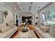Inviting living room with a coffered ceiling, neutral decor, and an open layout perfect for entertaining at 3085 Saint Andrews Dr, Duluth, GA 30096