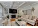 Elegant living room with a fireplace, decorative accents, and a comfortable seating arrangement, creating a cozy atmosphere at 3085 Saint Andrews Dr, Duluth, GA 30096