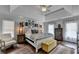Spacious main bedroom with a tray ceiling, wood floors, and decorative accents at 3085 Saint Andrews Dr, Duluth, GA 30096