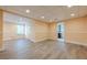 Finished basement with vinyl floors, recessed lighting, and neutral paint providing flexible living space at 3440 Canyon Oak Way, Cumming, GA 30041