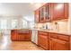 Elegant kitchen with stainless steel appliances and granite countertops at 3440 Canyon Oak Way, Cumming, GA 30041