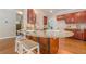 Gourmet kitchen boasts an island with seating and ample cabinet space at 3440 Canyon Oak Way, Cumming, GA 30041